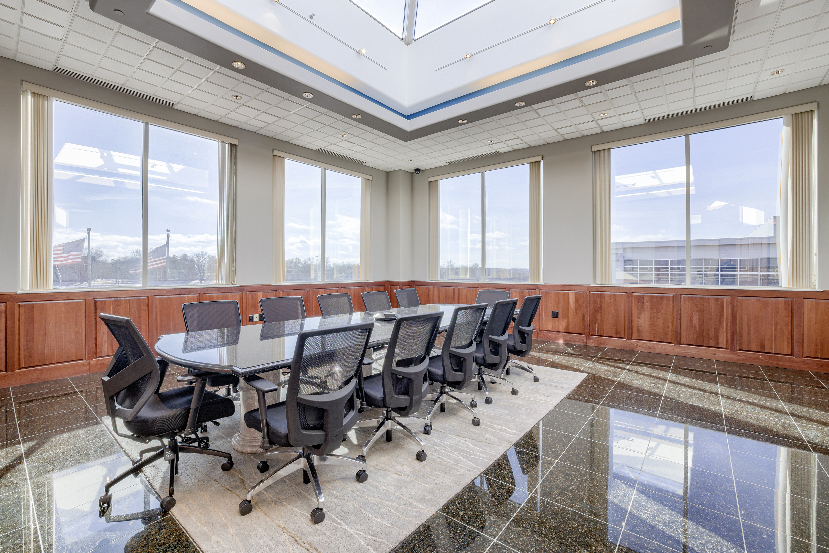 A sample conference room configuration within an available office space for lease in the Millennium Plaza building.